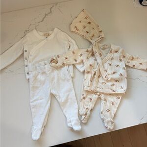 Two organic cotton newborn sets